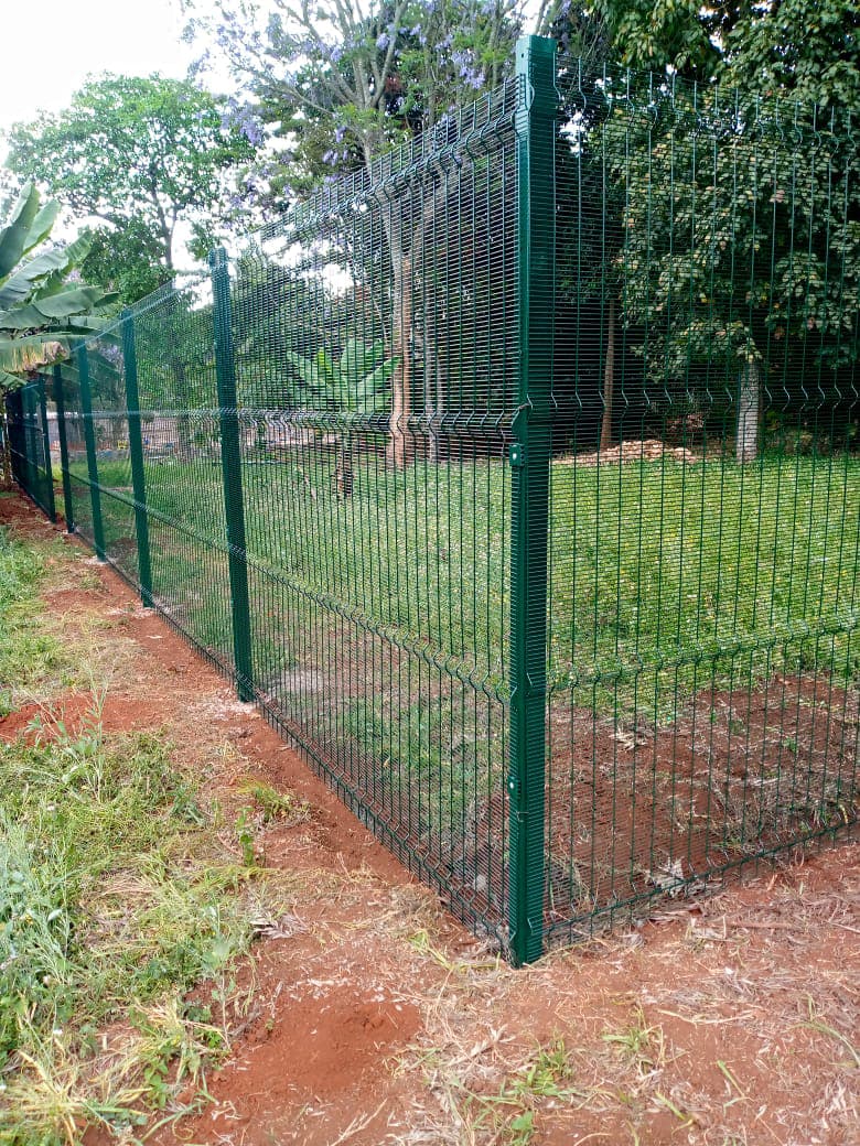 Green anti-climb security fence installed by Fence Volt Technologies